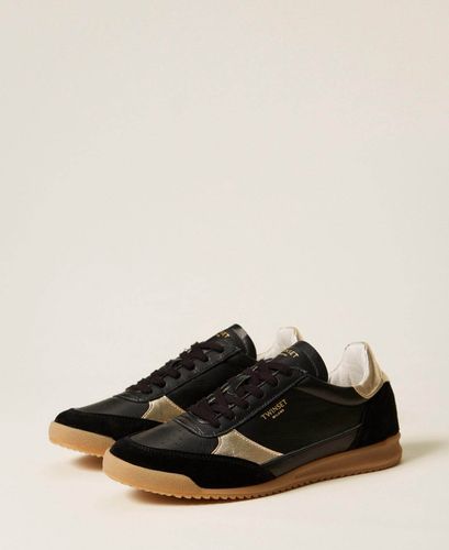 Running trainers with laminated details