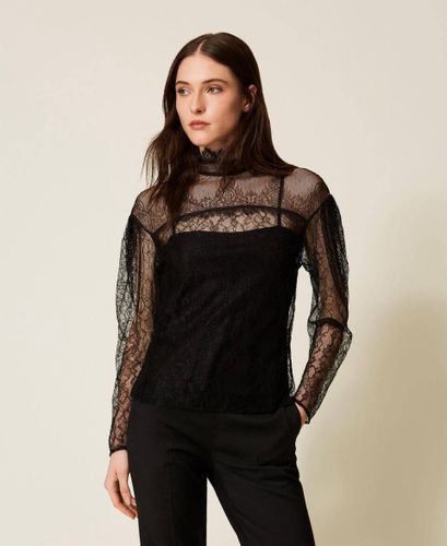 Lace blouse with ruffles