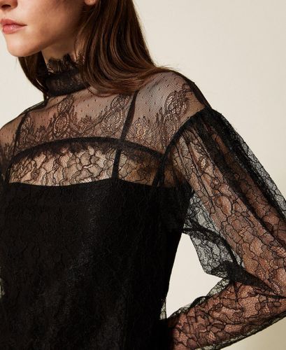 Lace blouse with ruffles