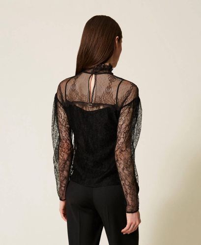 Lace blouse with ruffles