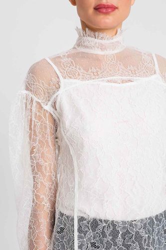 Lace blouse with ruffles