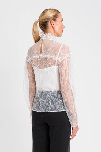 Lace blouse with ruffles