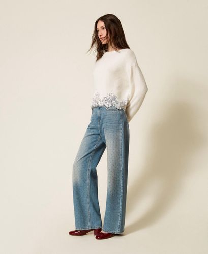 Five-pocket jeans with rhinestones