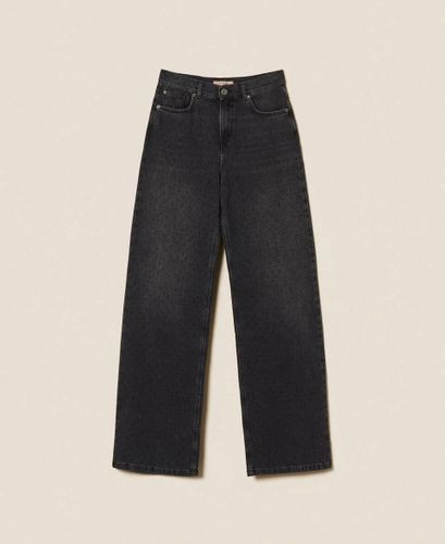 Black five-pocket jeans with rhinestones