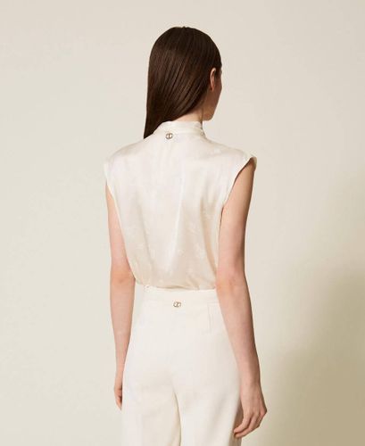 Jacquard satin top with bow