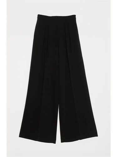 Wide leg crêpe trousers
