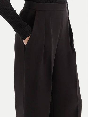 Wide leg crêpe trousers