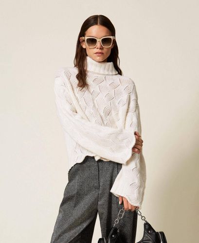 Wool blend turtle neck jumper with scalloped hem
