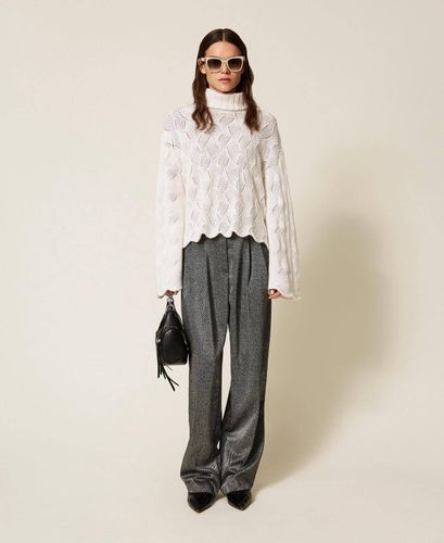 Wool blend turtle neck jumper with scalloped hem