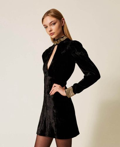 Short velvet dress with embroidery