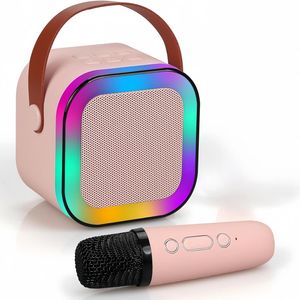 ערכת מיני קריוקי ביתית משולבת – רמקול עוצמתי ומיקרופון אלחוטי (ורוד)