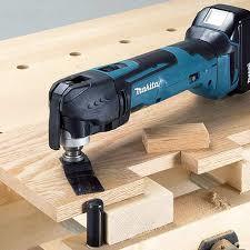 מולטיטול 18V נטען דגם DTM52 כולל סוללה 5AH (ללא מטען) מבית MAKITA מקיטה