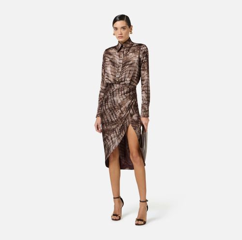 Dress in stretch satin fabric with alligator print