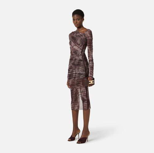 Dress in tulle fabric with alligator print
