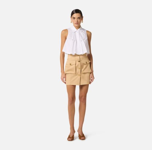 Cotton gabardine miniskirt with cargo pockets