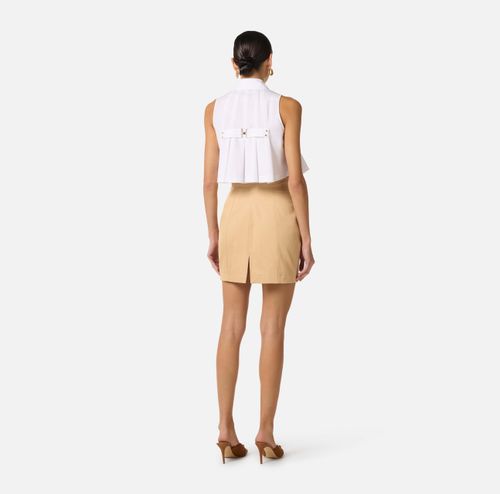 Cotton gabardine miniskirt with cargo pockets