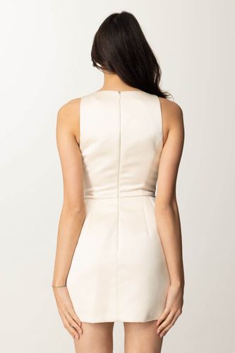 Dress in duchesse satin with embroidered flower