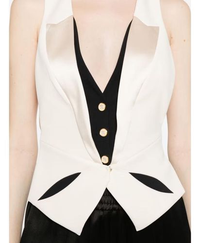 Waistcoat in lightweight crêpe fabric with two-colour cut-outs