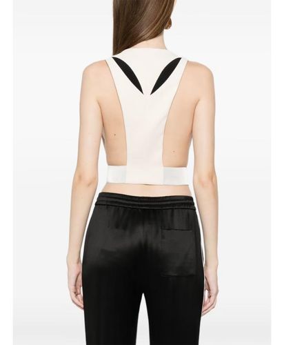 Waistcoat in lightweight crêpe fabric with two-colour cut-outs