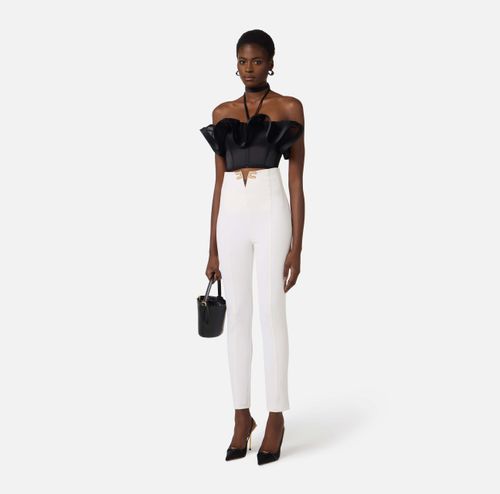 Trousers in double layer stretch crêpe fabric with logo details