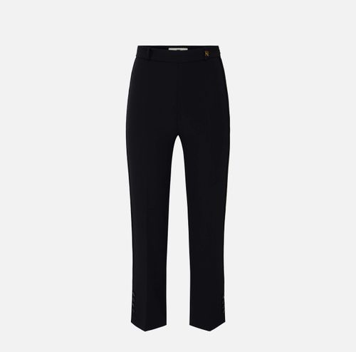 Trousers in double layer stretch crêpe fabric with logo charm