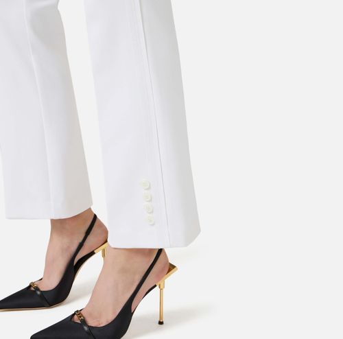 Trousers in double layer stretch crêpe fabric with logo charm