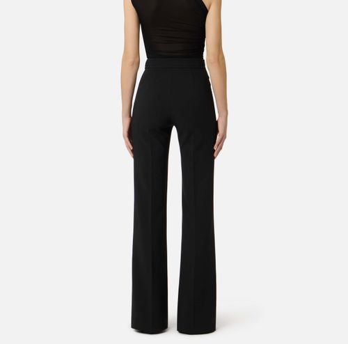 Trousers in double layer stretch crêpe fabric with embroidered logo