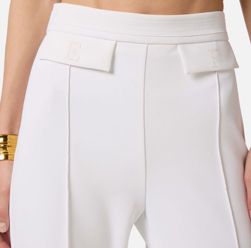 Trousers in double layer stretch crêpe fabric with embroidered logo