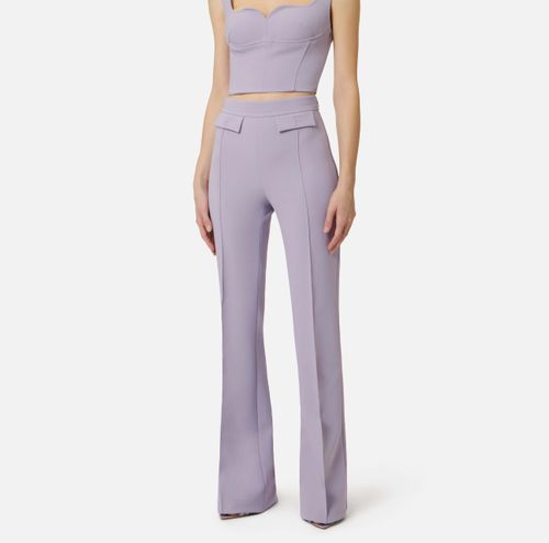 Trousers in double layer stretch crêpe fabric with embroidered logo