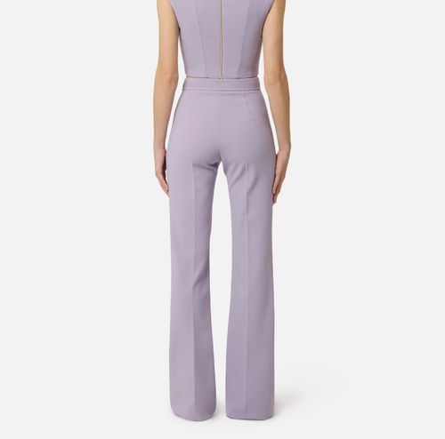 Trousers in double layer stretch crêpe fabric with embroidered logo