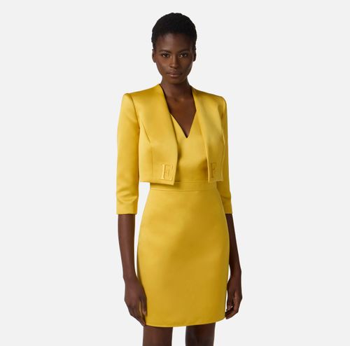 Dress in duchess satin and tulle with jacket