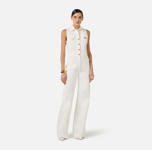 Denim jumpsuit with logo detail