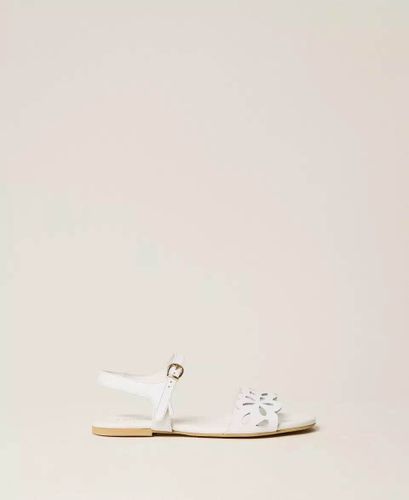 Leather sandals with floral pattern