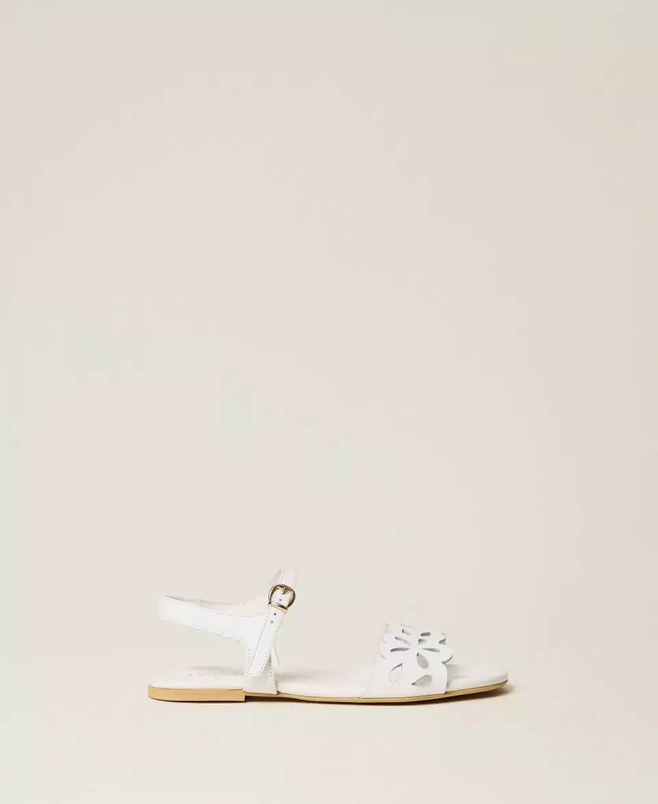 Leather sandals with floral pattern