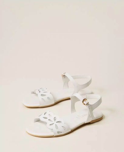 Leather sandals with floral pattern