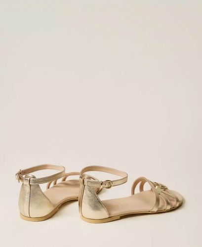 Laminated leather sandals with strap