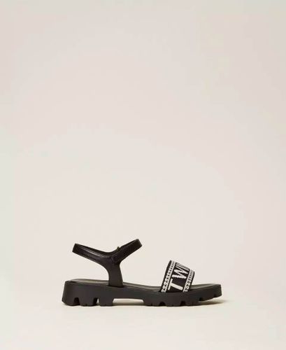 Leather sandals with jacquard logo