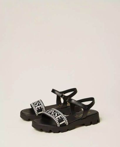 Leather sandals with jacquard logo