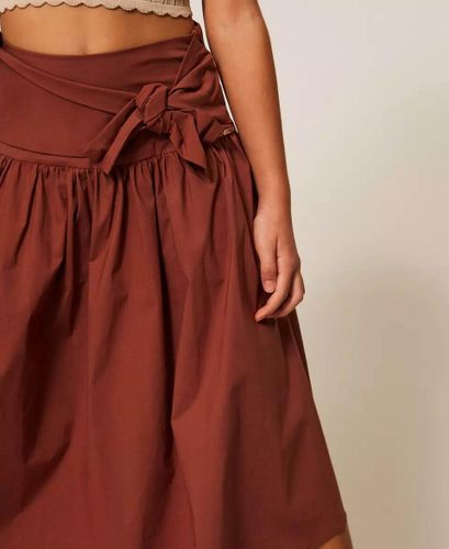 Asymmetric long poplin skirt