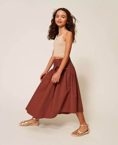 Asymmetric long poplin skirt