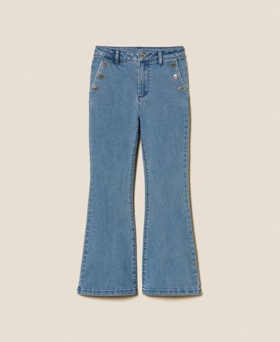 Flared jeans with buttons