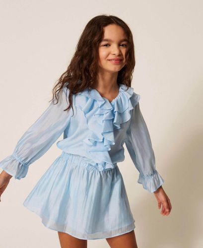 Short voile dress with ruffles and smocking