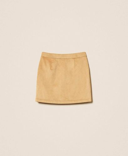 Short suede skirt with fringes
