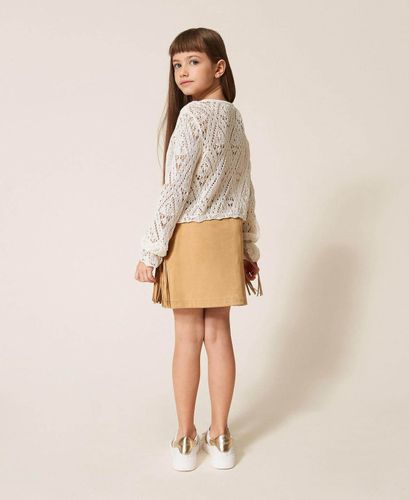 Short suede skirt with fringes