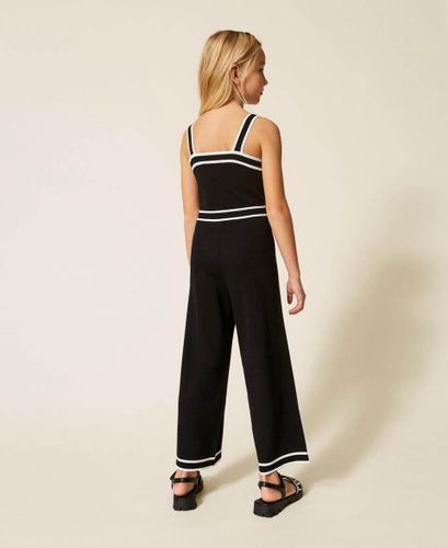 Knit jumpsuits with contrasting trims