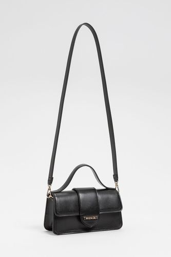 Shoulder bag with flap and logo