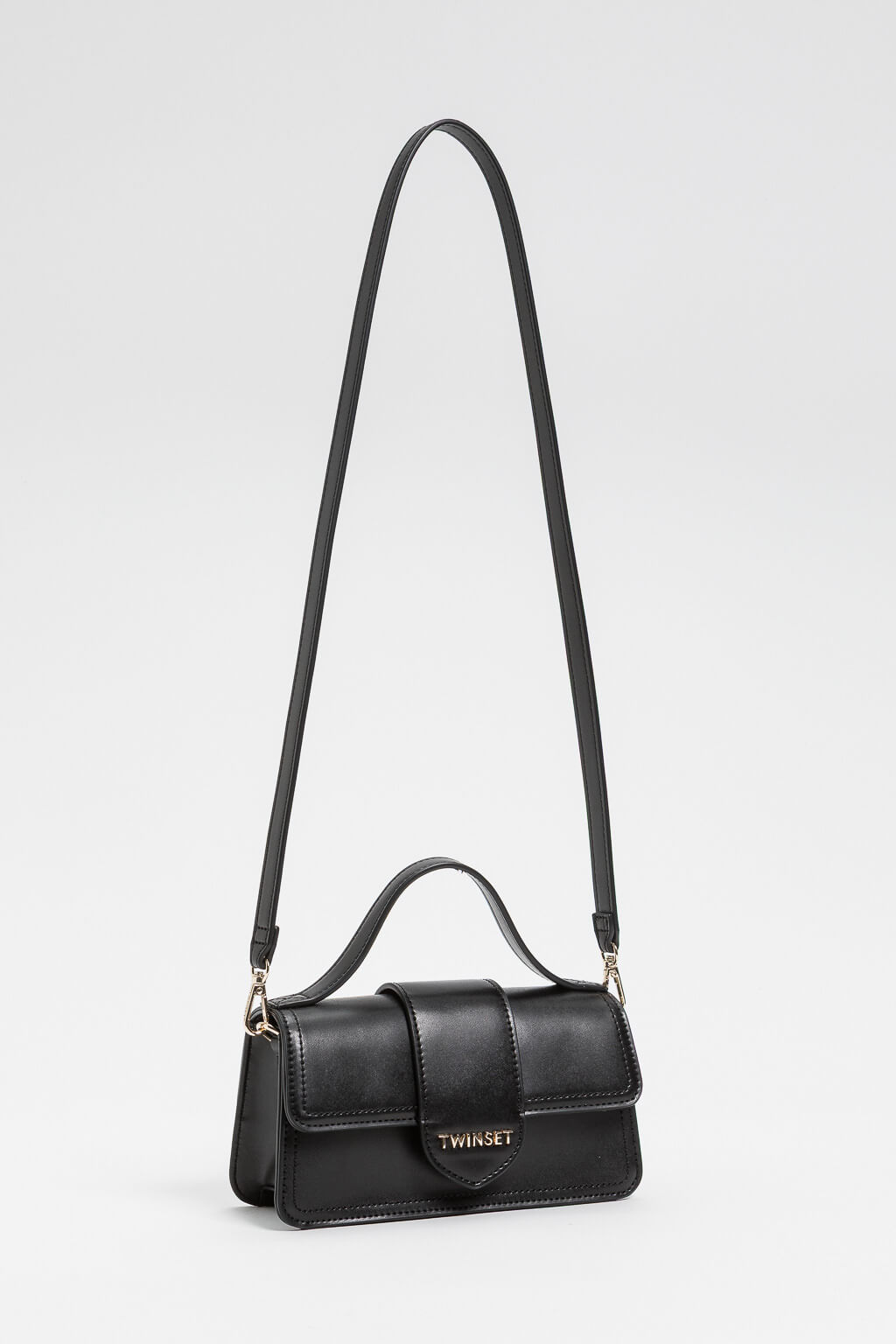 Shoulder bag with flap and logo