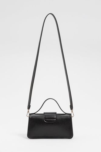 Shoulder bag with flap and logo
