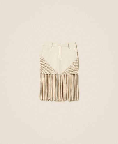 Bull denim miniskirt with fringes