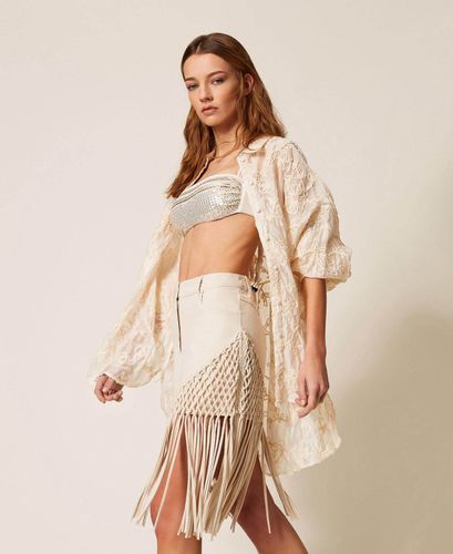 Bull denim miniskirt with fringes